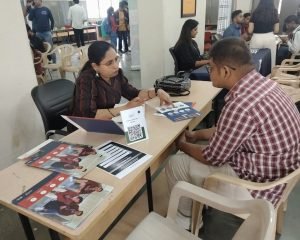 Giving Guidance to Students at an International Education Fair